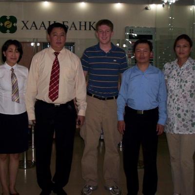 Projects Abroad Business Interns pose with Local Accountants in a bank during their Business Internship in Mongolia. Business Interns pose for a photo with staff at a local bank in Mongolia.